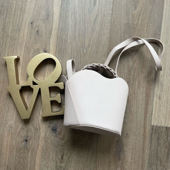 Anthropologie Handbags - Anthropologie Light Pink/Rose Bucket Bag with Braided Handle